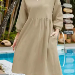 Réunion de mode pour femmes : Robe midi en lin fluide à coupe A-line, manches longues avec poches, parfait pour un look décontracté