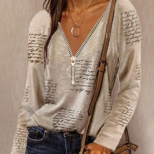 Chemisier chic à col en V pour femmes, avec détails zippés élégants - top confortable à manches longues pour toutes les occasions