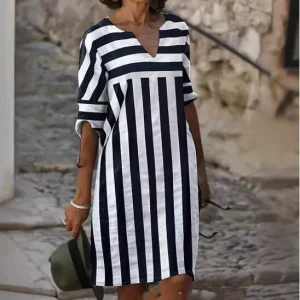 Robe femme longueur genou - motif rayé audacieux - décolleté en V - manches courtes - coupe en A élégante