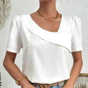 Top asymétrique à manches courtes pour femmes - manches bouffantes blanches à la mode pour un look chic et décontracté