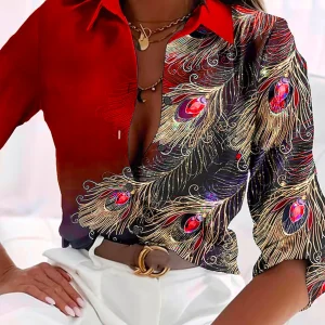 Élégant chemisier pour femmes avec un magnifique imprimé de plumes de paon - top stylé et à la mode