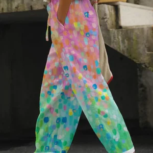 Élégant pantalon décontracté pour femmes avec un imprimé floral accrocheur - un vêtement d'intérieur confortable et aéré pour tous les jours